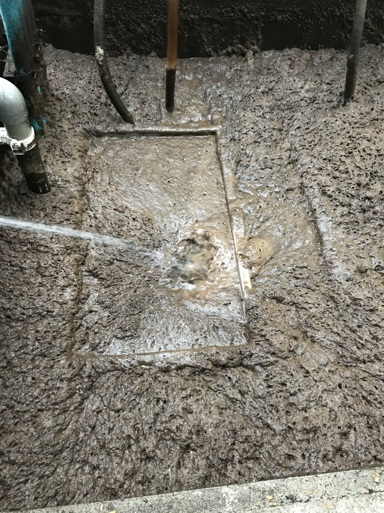 Water spraying used to suppress foam on an MBR tank surface